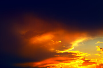 Red dark clouds on the sky with twilight
