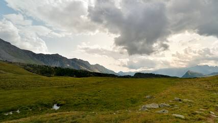 Fototapeta na wymiar Alps mounting range seen from Campagneda meadow
