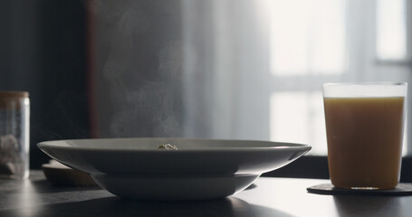 steam rising from penne pasta