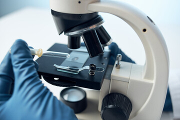 laboratory assistant chemical solutions biologist research study light background