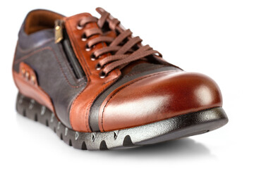 Brown leather male shoes isolated on white background