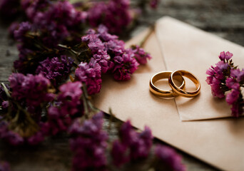 wedding rings and flowers