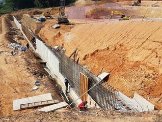 PENANG, MALAYSIA -MARCH 5, 2021: Reinforce Concrete retaining wall construction is in progress....