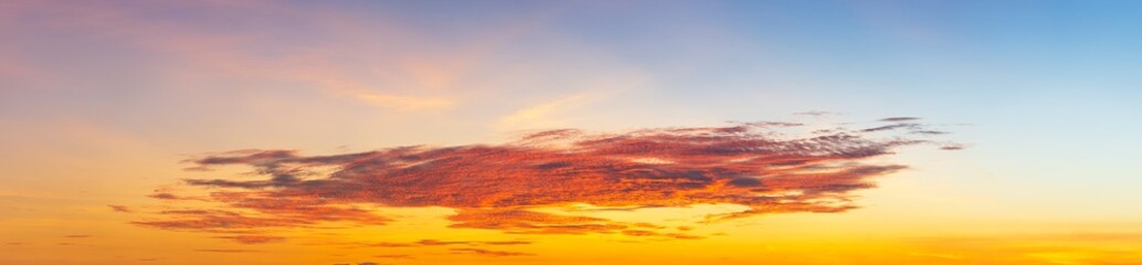Colorful clouds created by sunlight, panoramic beautiful natural phenomena background