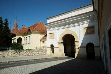 Fototapeta na wymiar Schei gate, Pedestrian and vehicle entrance gateway to historical city of Brasov, Romania