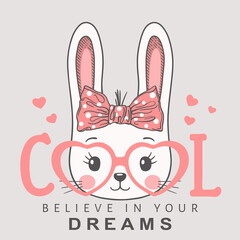 Obraz premium Cute cartoon rabbit girl face with pink heart glasses, bow. Cool slogan. Believe in your Dreams. Vector illustration design for t shirt graphics, fashion prints, slogan tees, posters and other uses