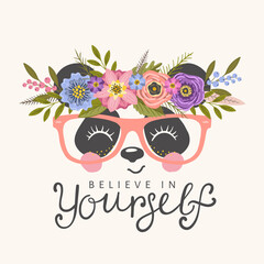 Panda face with floral wreath, glasses, smile for t-shirt graphics, fashion prints and other uses © Artificis