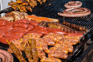 Various meats and sausaged on a grill