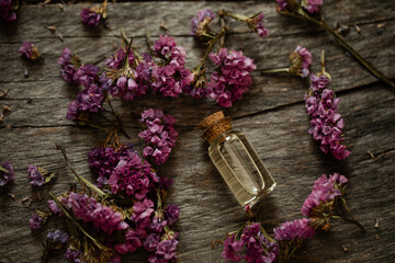 Oil bottle. Flowers. 