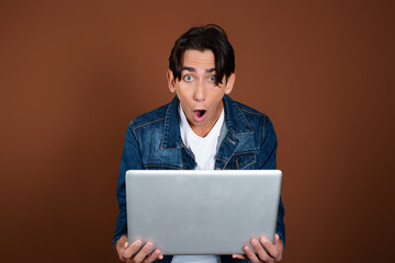 Handsome young guy. Student with laptop and tablet.