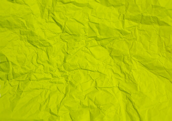 Fototapeta premium Crumpled green paper abstract background texture