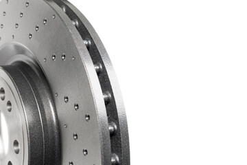 Car brake disc isolated on white background. Auto spare parts. Perforated brake disc rotor isolated...