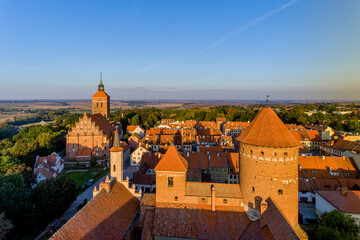 Panorama of the city of Reszel at sunrise, Castle and the Church of the Holy Apostles Peter and...