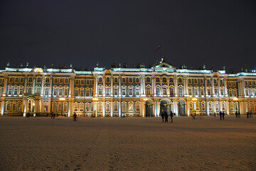 Fototapeta na wymiar Winter Palace decorated for the holiday with illumination on a winter evening in St. Petersburg