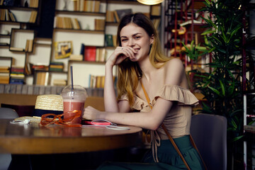 beautiful woman reading a book in a cafe Lifestyle