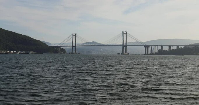 Sailing in the ria of Vigo near the Rande bridge