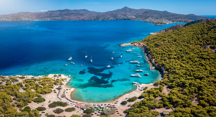 Panoramic aerial view of the popular beach of Moni island, next to the village Perdika on Aegina island with turquoise sea, Saronic Gulf, Greece - obrazy, fototapety, plakaty