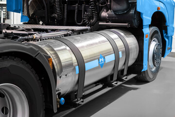 Fototapeta na wymiar A hydrogen fuel cell semi truck with H2 gas cylinder onboard. Eco-friendly commercial vehicle concept