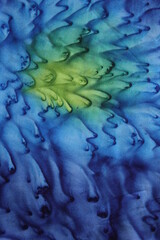 alcohol ink blue on fabric blown with hairdryer background texture sea water liquid concept 