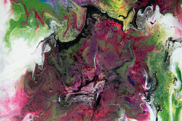 Texture in the style of fluid art. Abstract background with paint mixing effect. Liquid acrylic paint background. Blue, black, white, pink and purple colors.