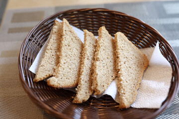 Pieces wheat bread in basket