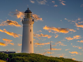 Hirtshals lighthouse (Hirtshals fyr) a famous landmark in the seaport town on the coast of Skagerrak at the top of the Jutland peninsula, Denmark. - obrazy, fototapety, plakaty