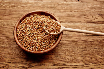 plate with grain organics wooden table kitchen ingredients healthy food