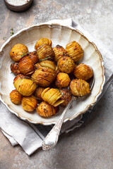 baked potatoes with thyme, rosemary and garlic