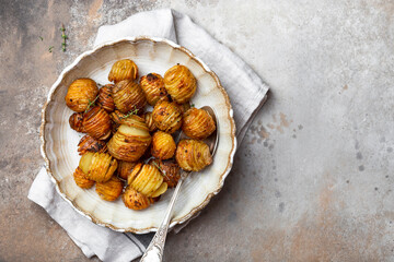 baked potatoes with thyme, rosemary and garlic