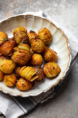 baked potatoes with thyme, rosemary and garlic
