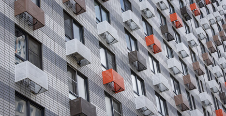 There are many windows of residential apartments