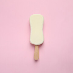 Ice cream with glaze on pink background, top view