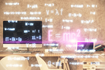 Double exposure of formulas drawing and office interior background. Concept of education.