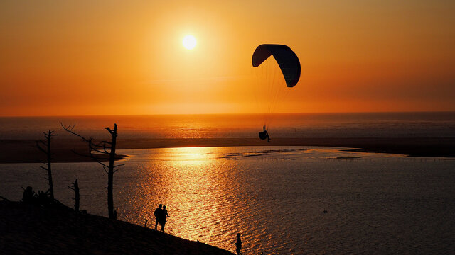 couch&eacute; du soleil face au blanc d'arguin et la dune du pilat 