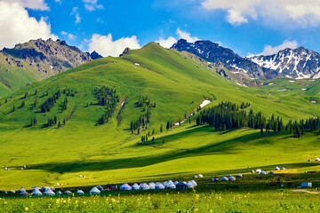 Mongolia yurts in the summer meadows in Nalati scenic spot, Xinjiang Uygur Autonomous Region, China.