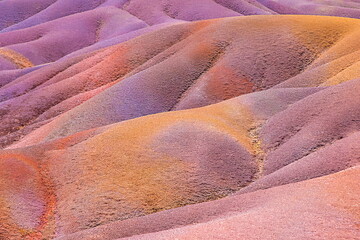 Earth of seven colors, Chamarel, Mauritius. Natural background from multi-colored sand. Selective...