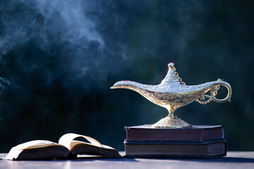 Aladdin lamp of wishes in magic smoke
