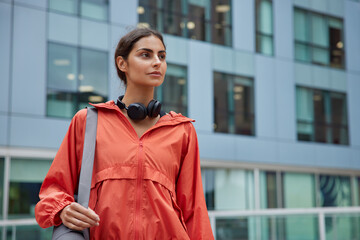 Motivated woman improves her wellbeing develops physical agility and proper body coordination finds...