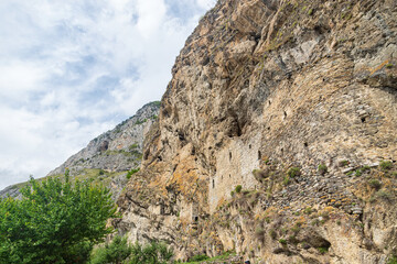 The wall of an ancient defensive fortress in the mountains of North Ossetia