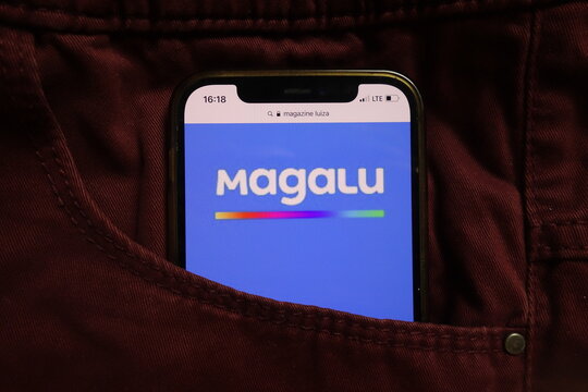KONSKIE, POLAND - September 04, 2021: Magazine Luiza SA logo on mobile phone hidden in jeans pocket
