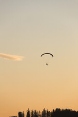 sunset in the mountains with rogalo