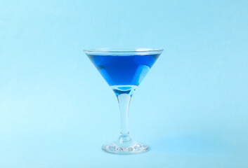 Margarita blue cocktail on blue background