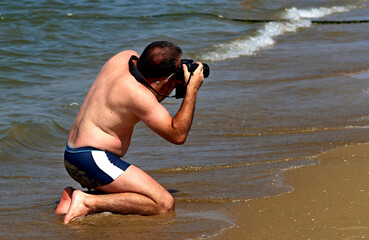 photographer on the seashore