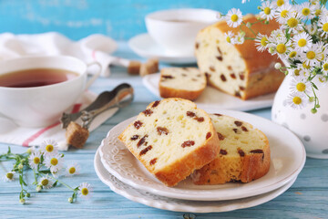 Summer dessert. Raisin cake and two cups of tea