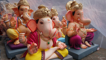 Fototapeta premium Hindu God Ganesha. Ganesha Idol on plain background.