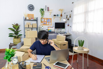 E-commerce concept male online merchant having success on his business when the sales reach the target