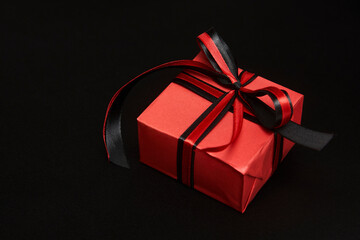Black friday sale concept with gift box with ribbon
