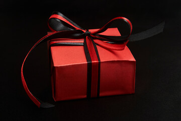 Black friday sale concept with gift box with ribbon