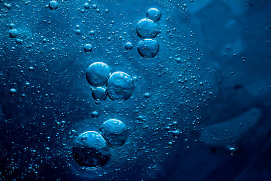 Blue water texture as aquatic background, nature and science concept, skincare cosmetics and hygiene macro closeup.