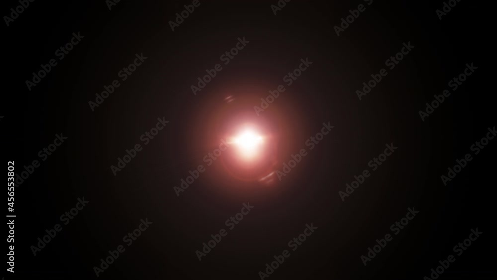 Aufkleber abstract rotating searchlight optical lens flares burst shiny animation on black background loop. 4k